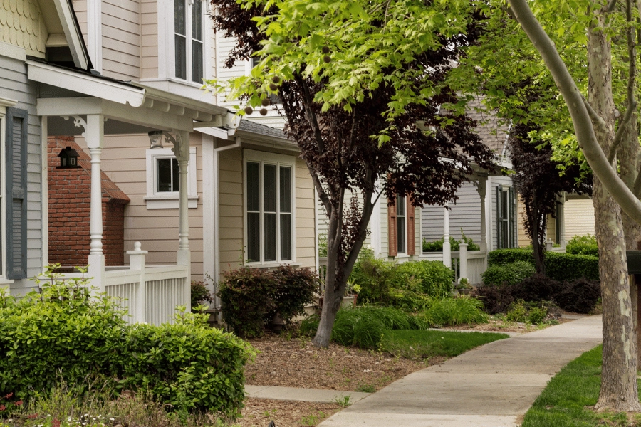tree lined street and shaded sidewalk in a family-friendly neighborhood